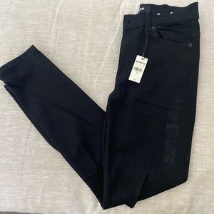 Black distressed skinny jeans